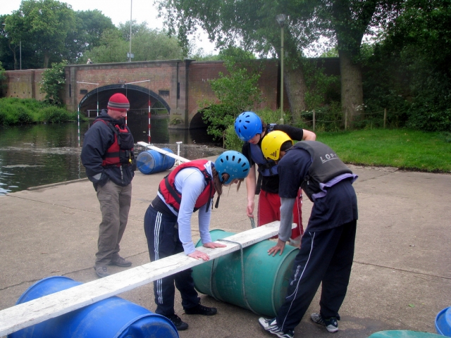 The instructor supervises the technical and safety aspects of the course